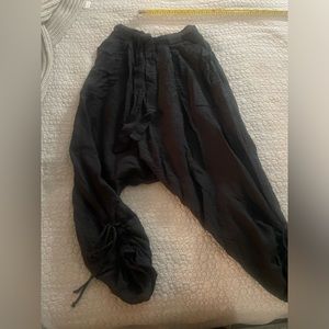 Free people Black gauzy cotton harem pants. Adjustable tie waist.